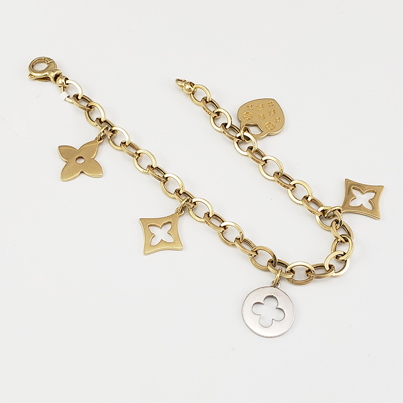 Louis Vuitton Blooming Supple Gold Tone Charm Bracelet at 1stDibs  blooming  bracelet, louis vuitton flower full bracelet, lv blooming bracelet