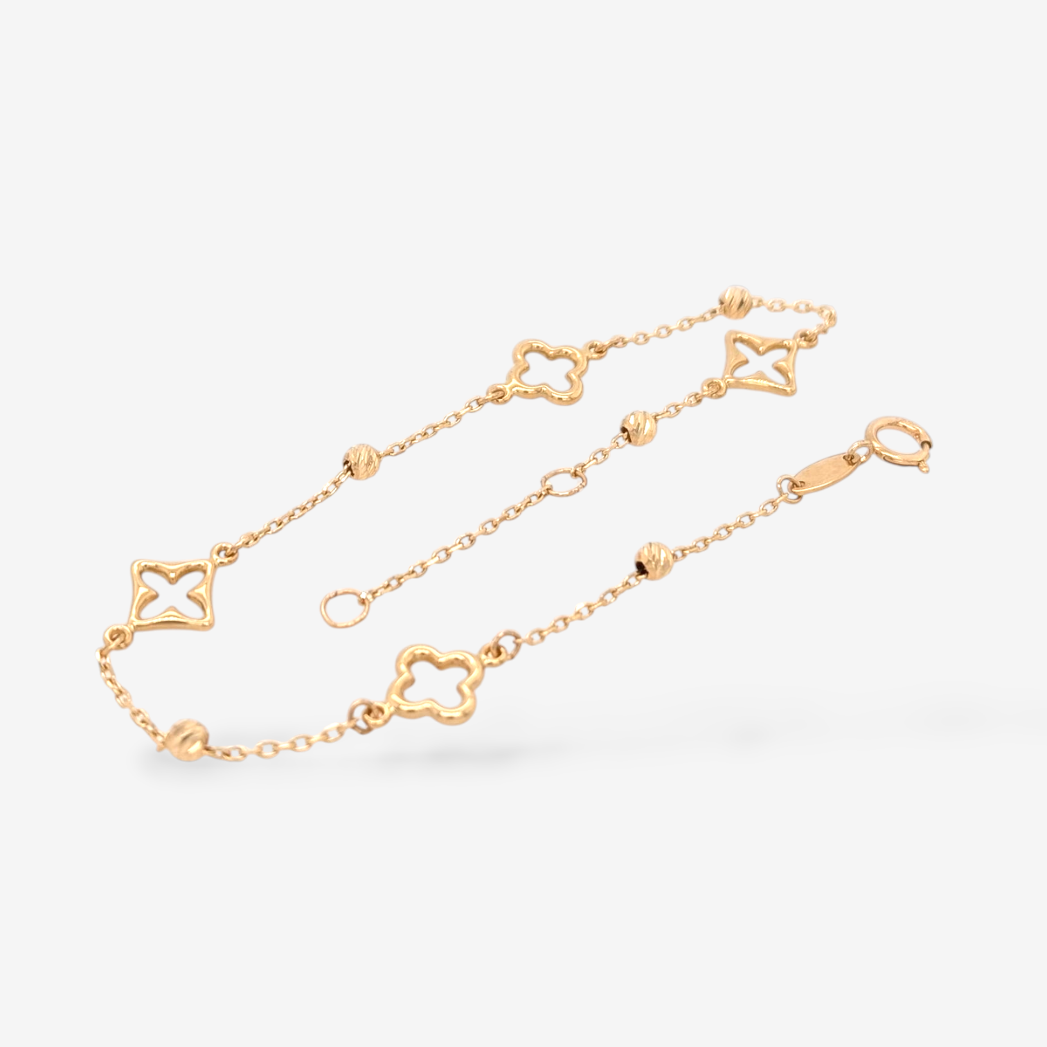 Brazalete (19 cm) Cable c/ Treboles Calados & Esferas Diamantadas (2.6 mm) c/ Cierre Spring - Oro Amarillo 18Kts