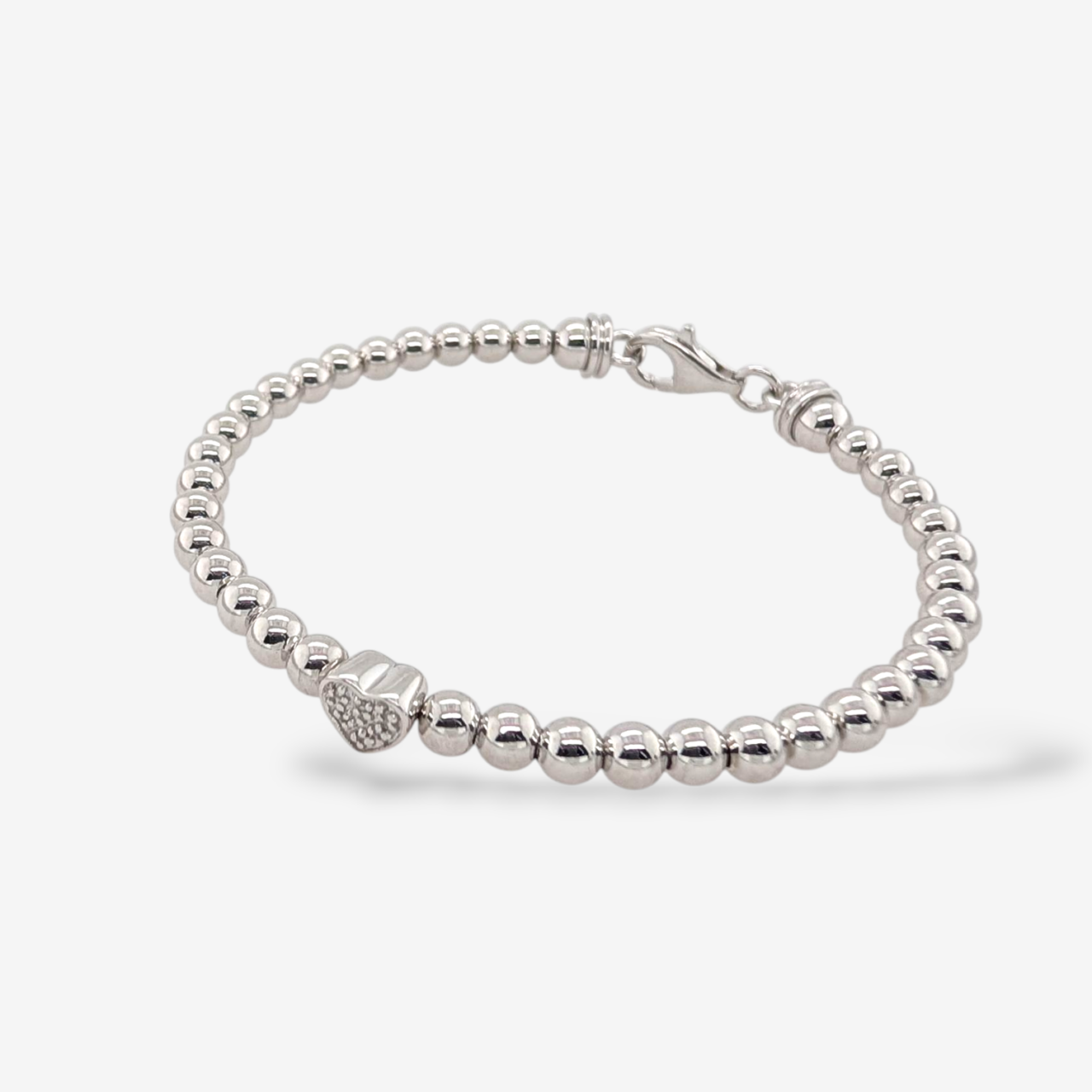 Brazalete (#17) Esferas Lisas (4 mm) Corazon Central c/ Diamantes Pave (0.02 Ct) Cierre Lobster - Plata