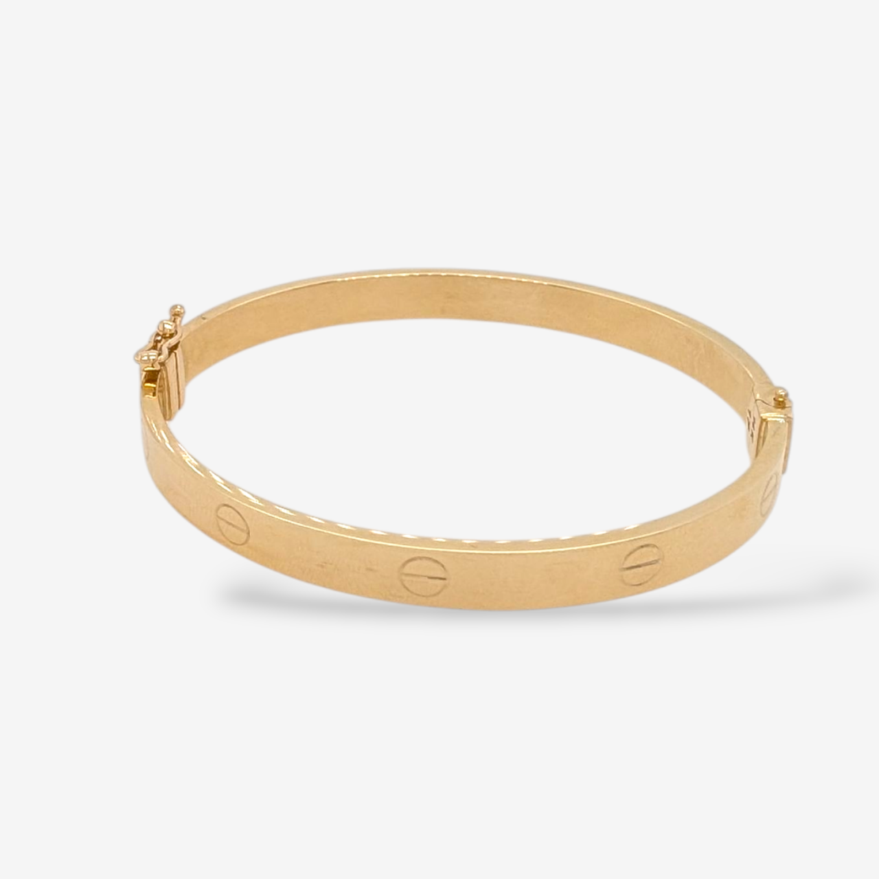 Pulsera (#17) Bangle c/ Circulos Estampados Light (6 mm) c/ Cierre 8 de Seguridad - Oro Amarillo 18Kts